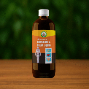 A brown bottle labeled AB Advance Guts Kare with health icons and a human anatomy illustration stands on a wooden surface. The background is green and blurred.